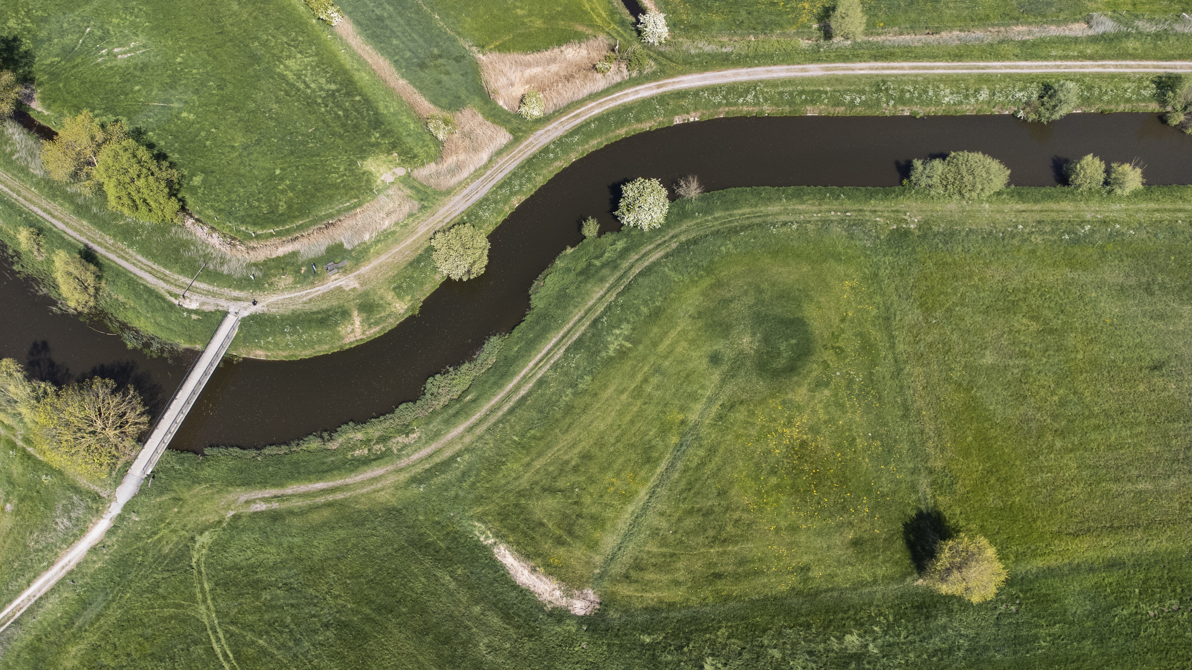 Handzamevallei landscape — watercourse and surrounding fields